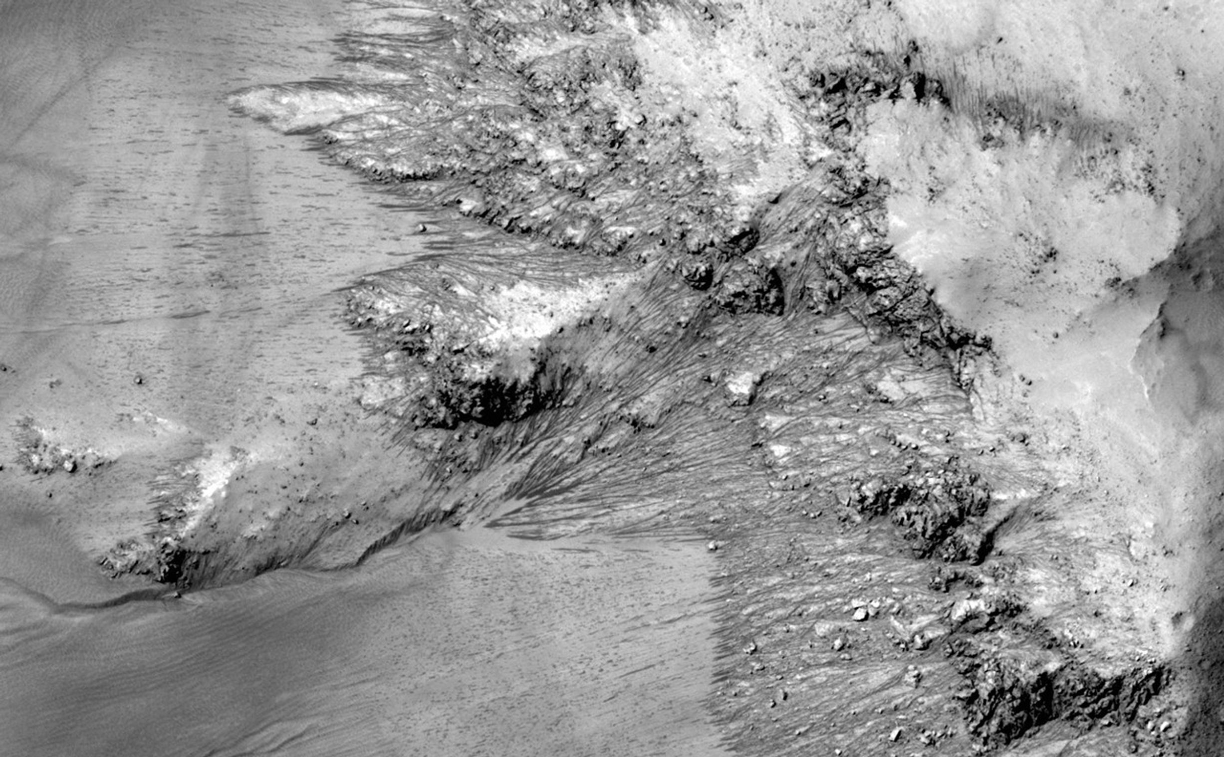 This series of images shows warm-season features that might be evidence of salty liquid water active on Mars today.