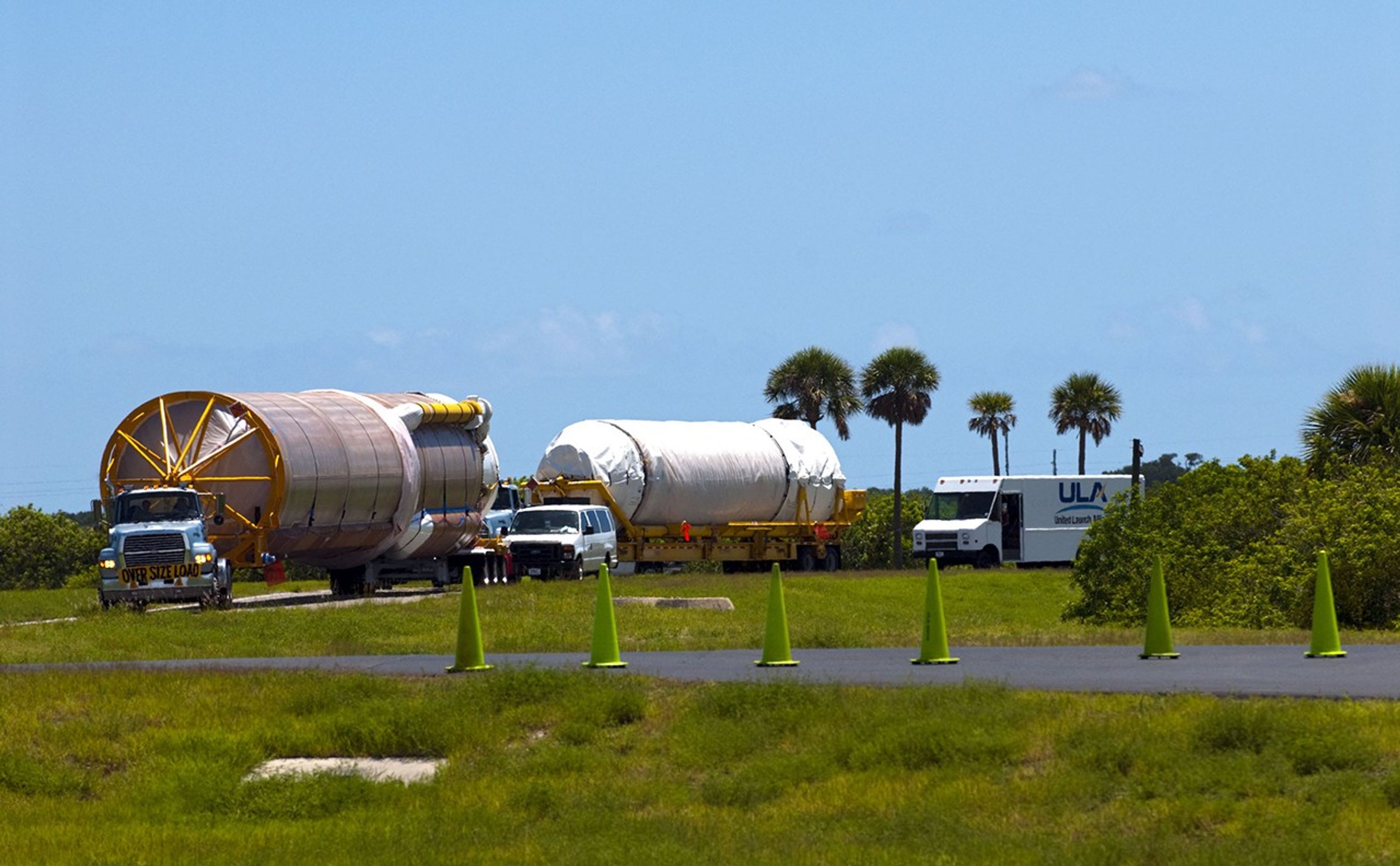 The Atlas V first stage (left) and Centaur upper stage to support the Mars Science Laboratory (MSL) mission approach the Atlas Spaceflight Operations Center on Cape Canaveral Air Force Station in Florida.