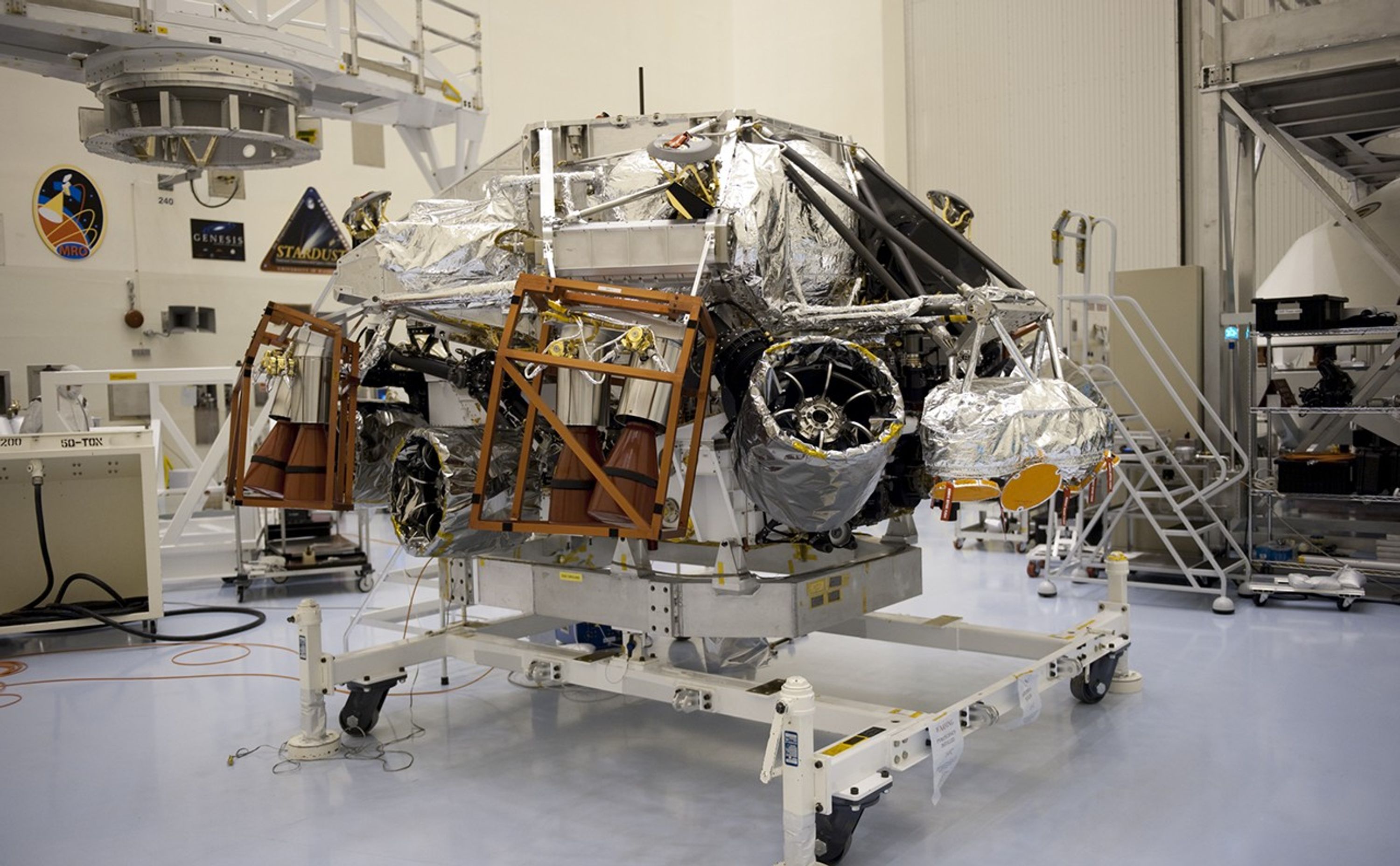 At the Payload Hazardous Servicing Facility at NASA's Kennedy Space Center in Florida, integration between a rocket-powered descent stage and NASA's Mars Science Laboratory (MSL) rover, known as Curiosity, is complete. The descent stage will lower Curiosity to the surface of Mars.