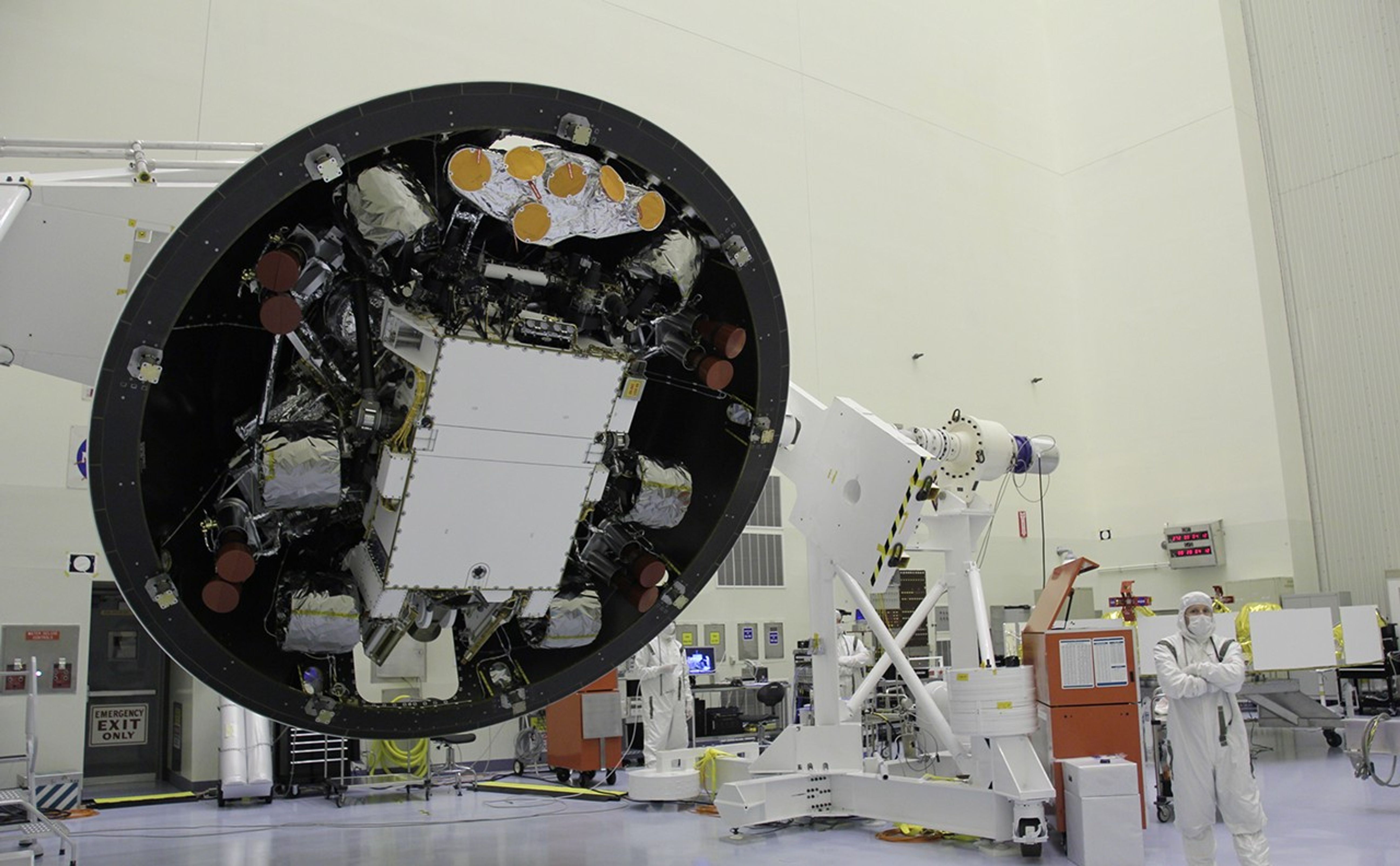 At the Payload Hazardous Servicing Facility at NASA's Kennedy Space Center in Florida, the "back shell powered descent vehicle" configuration of NASA's Mars Science Laboratory is being rotated for final closeout actions.