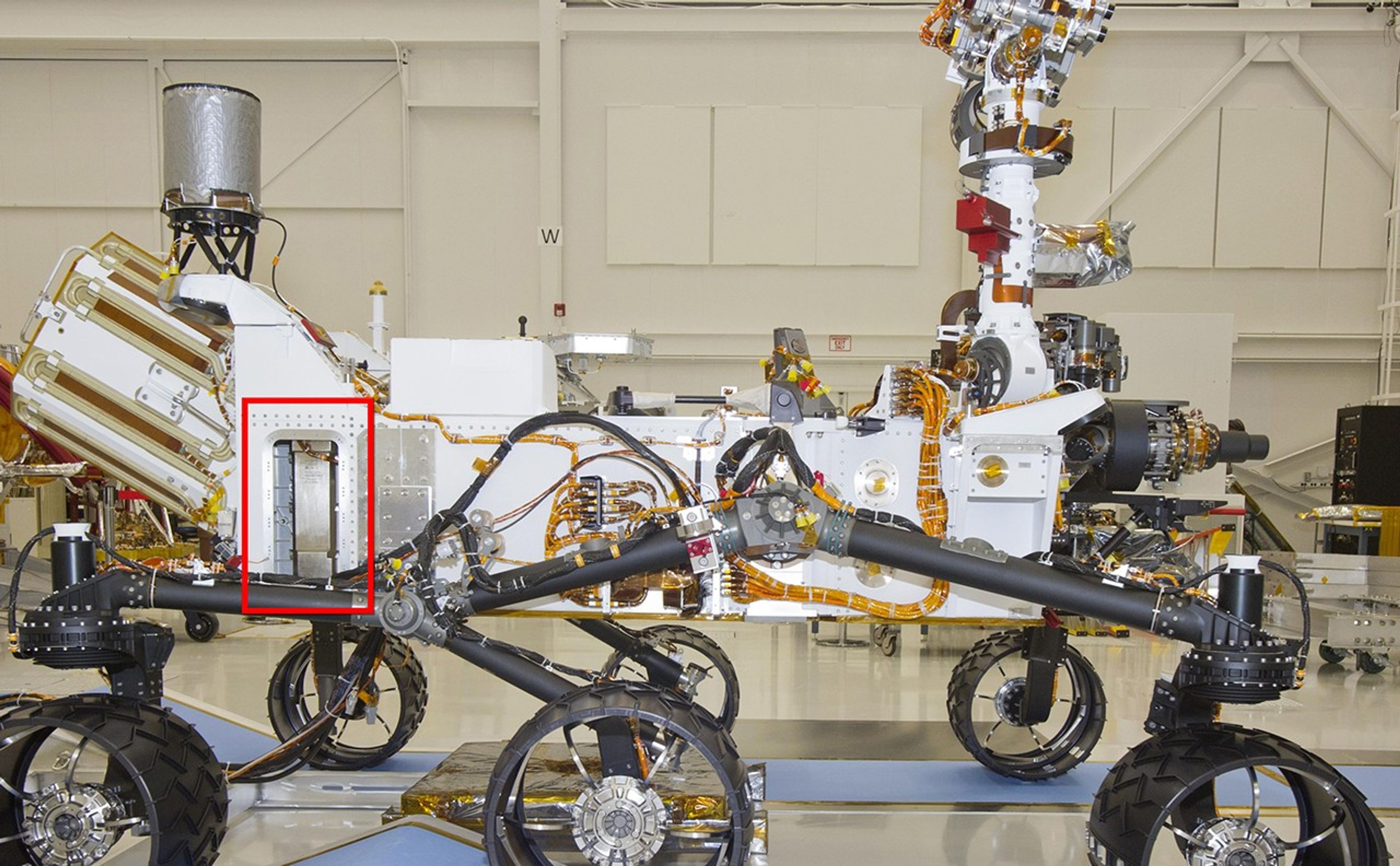 A Russian-built, neutron-shooting instrument on the Curiosity rover of NASA's Mars Science Laboratory mission will check for water-bearing minerals in the ground beneath the rover.