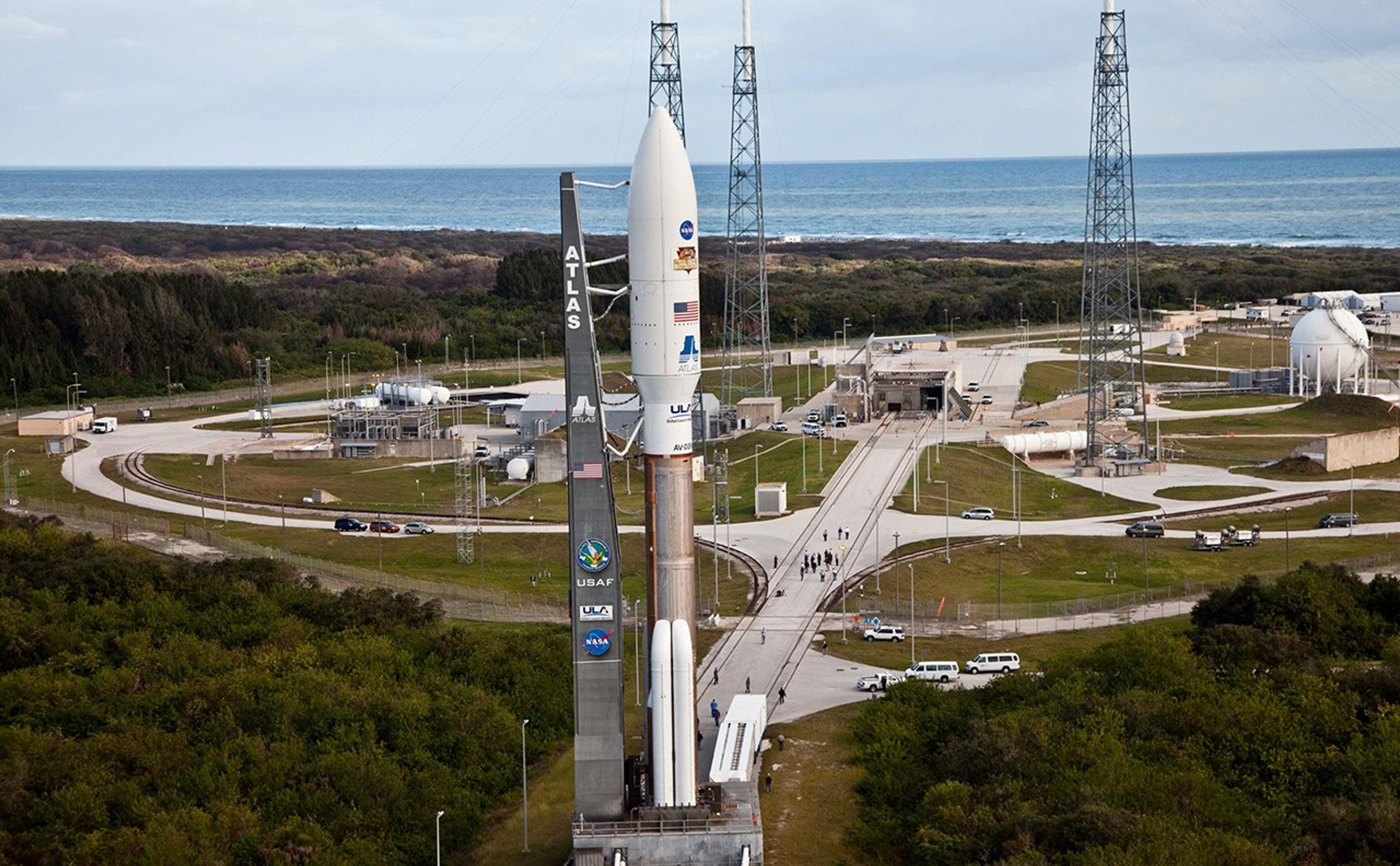 A United Launch Alliance Atlas V rocket with NASA's Mars Science Lab (MSL) rover Curiosity rolls out to its Space Launch Complex-41 launch pad arriving at 8:40 a.m. EST today.