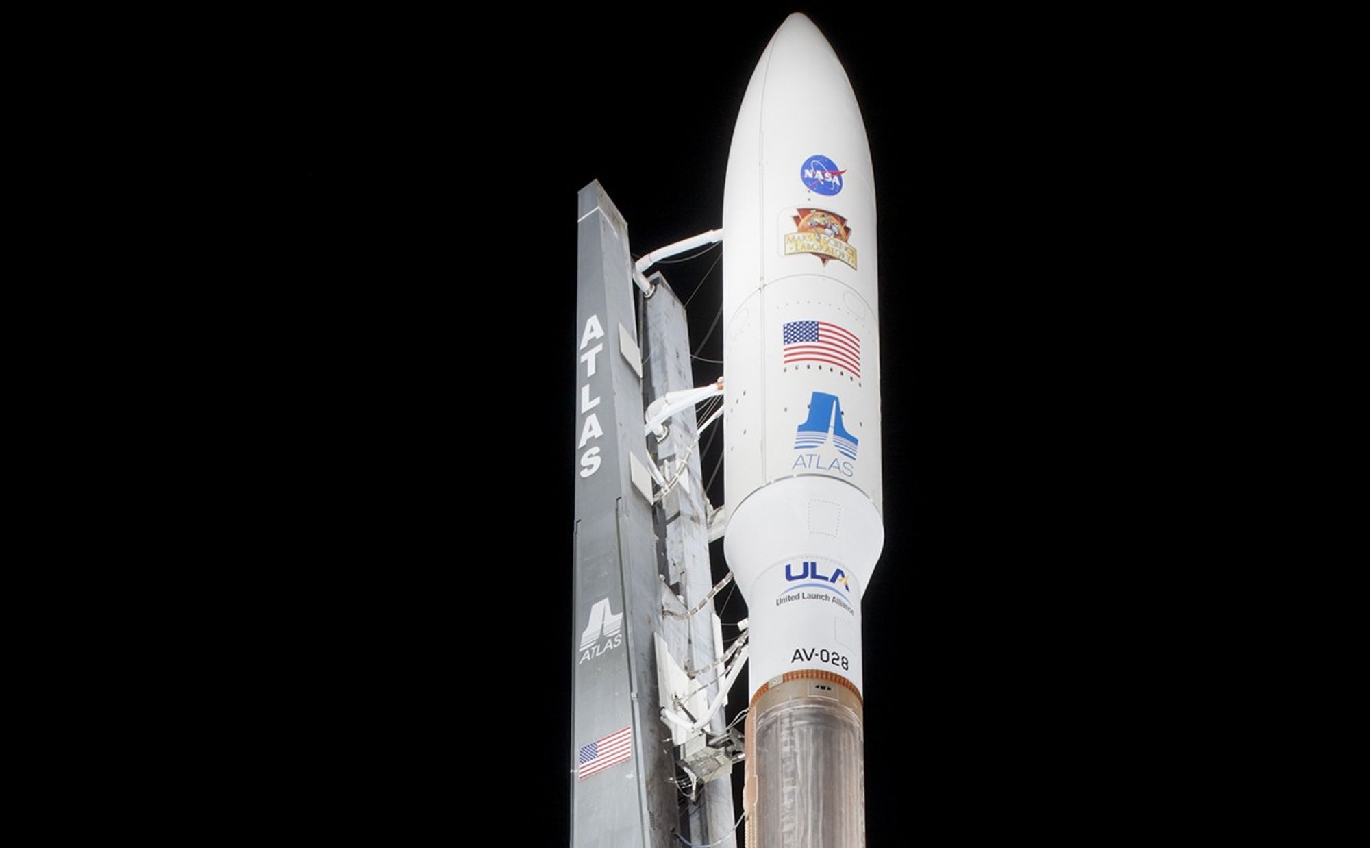 With NASA's Mars Science Laboratory (MSL) spacecraft sealed inside its payload fairing, the United Launch Alliance Atlas V rocket stands ready for launch at Space Launch Complex-41 on Cape Canaveral Air Force Station in Florida.