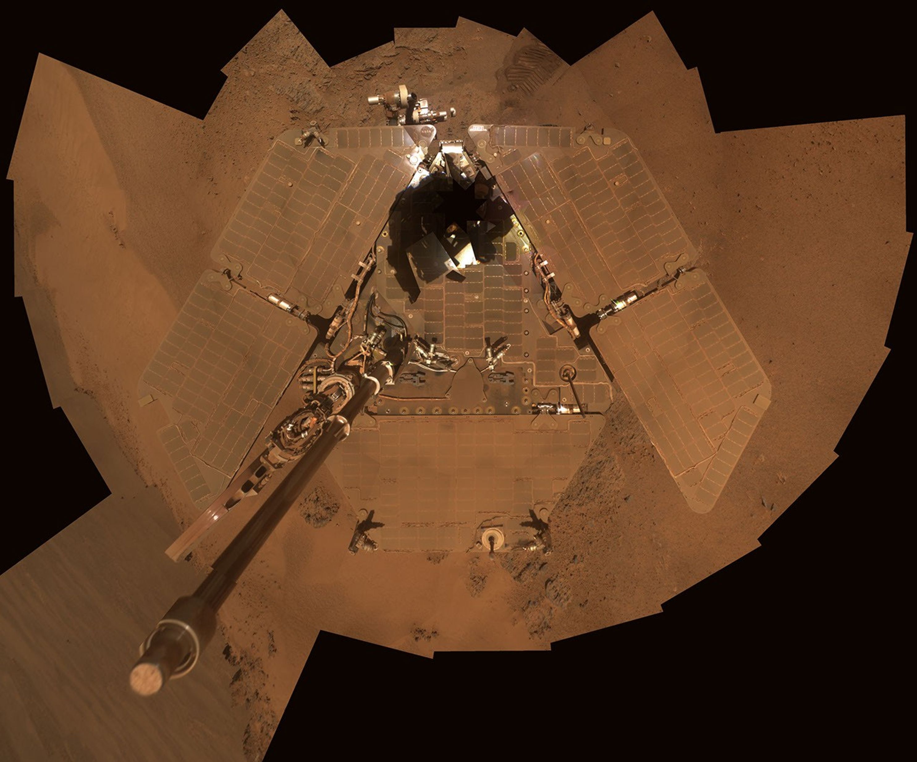 This self-portrait from Opportunity shows dust accumulation on the rover's solar panels as the mission approached its fifth Martian winter.