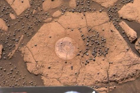 This image from the Mars Exploration Rover Opportunity's panoramic camera is an approximate true-color rendering of the exceptional rock called "Berry Bowl" in the "Eagle Crater" outcrop.