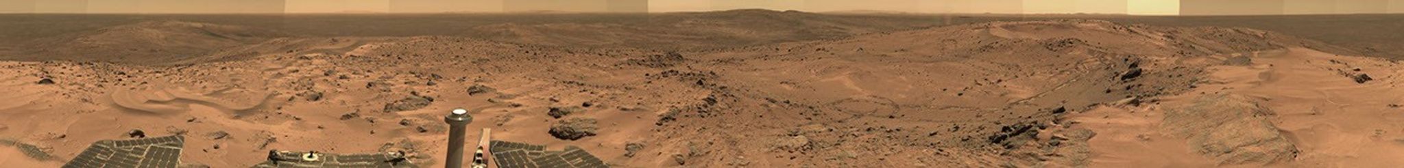 If a human with perfect vision donned a spacesuit and stepped onto the martian surface, the view would be as clear as this sweeping panorama taken by Spirit.
