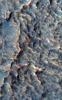 Gullied Crater Slope with Rocky Outcrops Northeast of Hellas Region