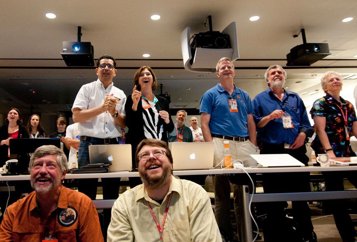 Excitement builds at NASA's Jet Propulsion Laboratory when news of a successful parachute deployment from the Mars Science Laboratory spacecraft reaches the science team.