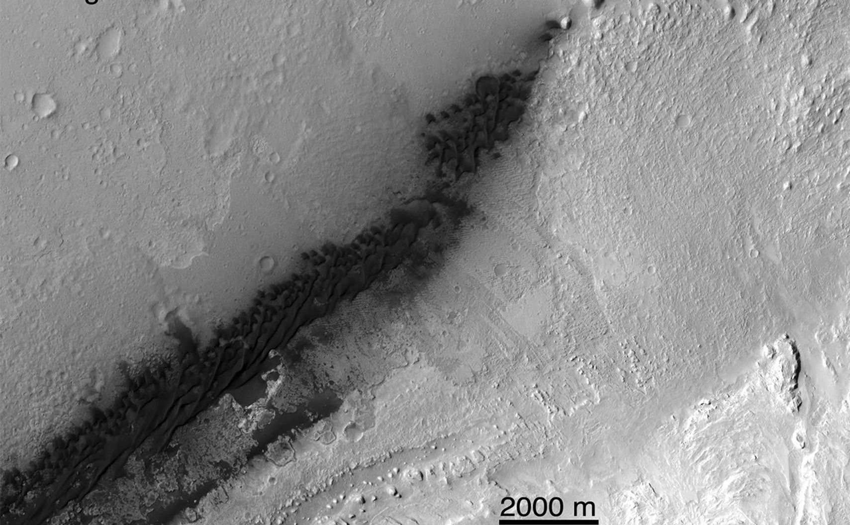 These images from NASA's Mars Reconnaissance Orbiter (MRO) show a before-and-after comparison of the area where NASA's Curiosity rover landed on Aug. 5 PDT (Aug. 6 EDT).