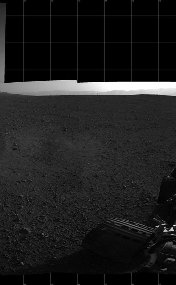 With the addition of four high-resolution Navigation Camera, or Navcam, images, taken on Aug. 18 (Sol 12), Curiosity's 360-degree landing-site panorama now includes the highest point on Mount Sharp visible from the rover.