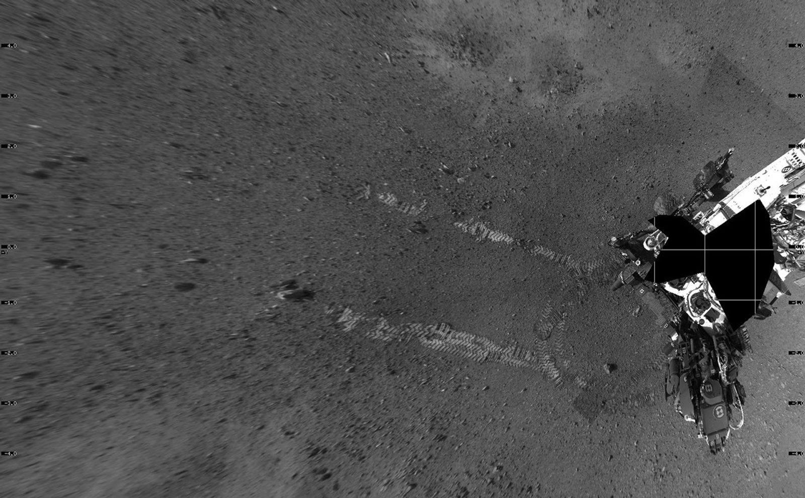 This overhead view shows evidence of a successful first test drive for NASA's Curiosity rover.