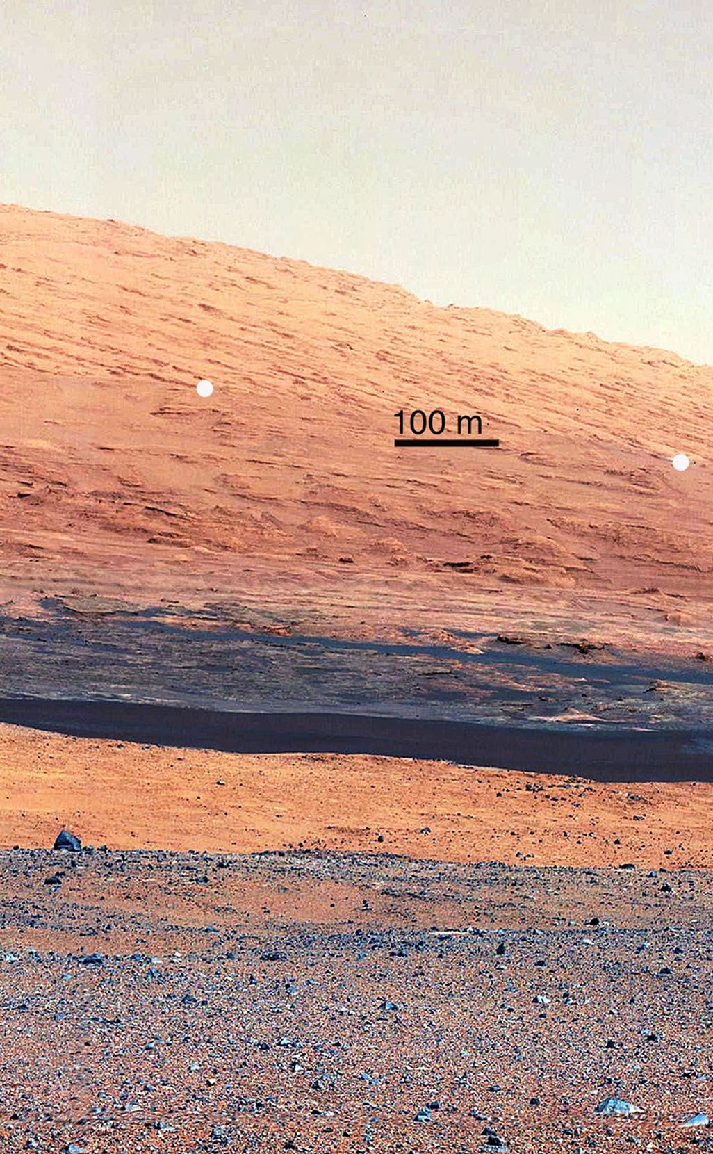 This image taken by the Mast Camera (MastCam) on NASA's Curiosity rover highlights the interesting geology of Mount Sharp, a mountain inside Gale Crater, where the rover landed.