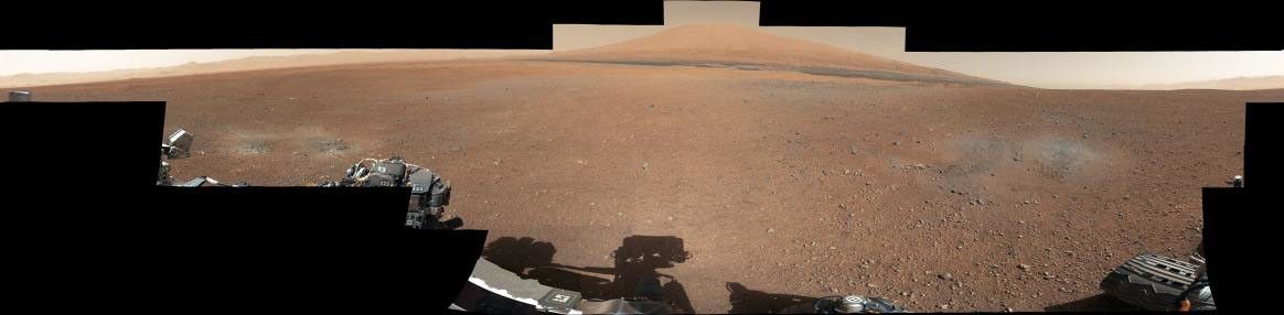 This color panorama shows a 360-degree view of the landing site of NASA's Curiosity rover, including the highest part of Mount Sharp visible to the rover. That part of Mount Sharp is approximately 12 miles (20 kilometers) away from the rover.