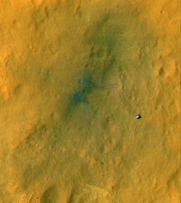 Tracks from the first drives of NASA's Curiosity rover are visible in this image captured by the High-Resolution Imaging Science Experiment (HiRISE) camera on NASA's Mars Reconnaissance Orbiter.