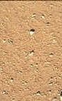 As the last step in a series of inspections of the Mars Hand Lens Imager (MAHLI) aboard NASA's Mars rover Curiosity, this camera's reclosable dust cover was opened for the first time during the 33rd Martian day, or sol, of the rover's mission on Mars (Sept. 8, 2012), enabling MAHLI to take the center image of this set.