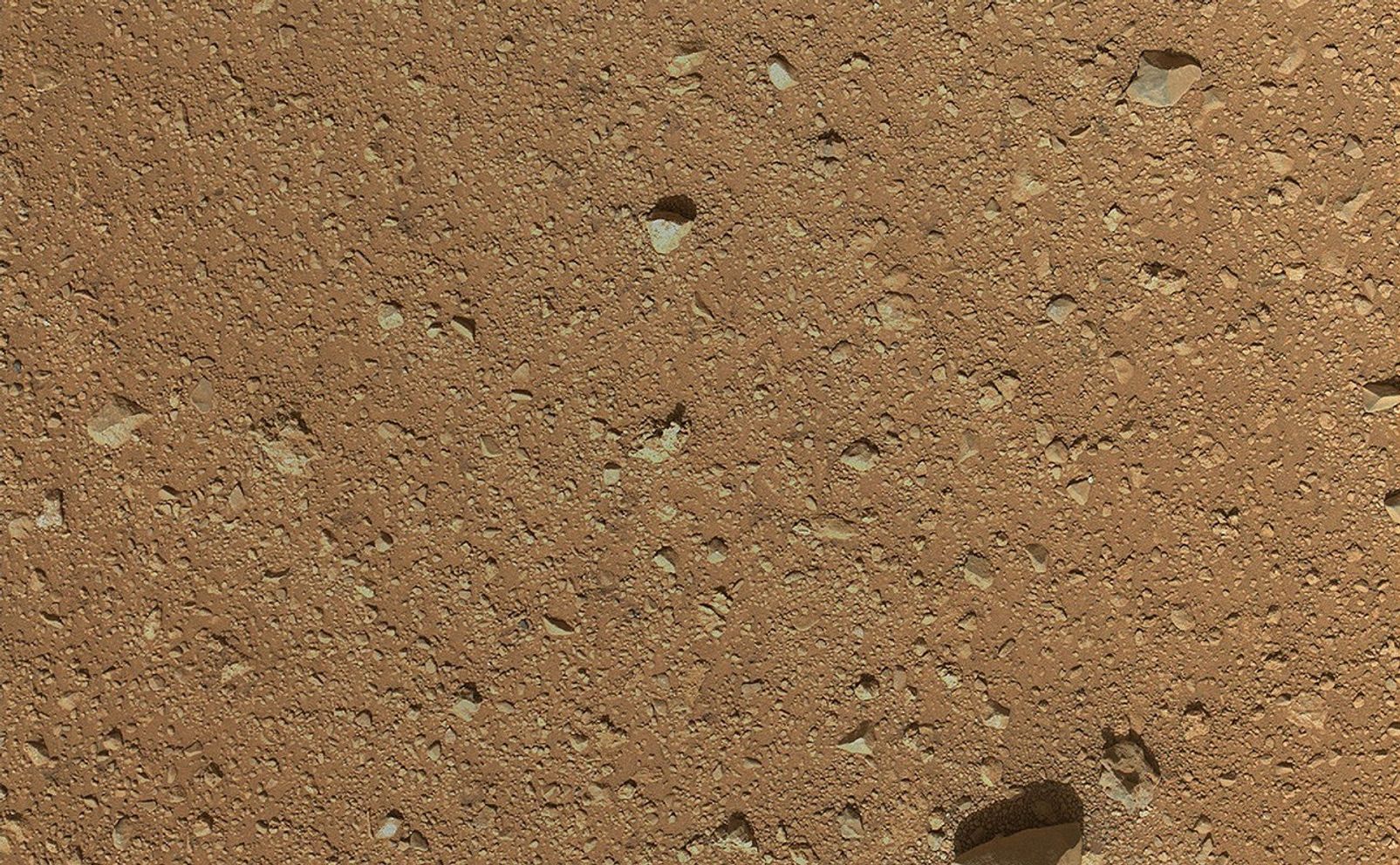 The reclosable dust cover on Curiosity's Mars Hand Lens Imager (MAHLI) was opened for the first time during the 33rd Martian day, or sol, of the rover's mission on Mars (Sept. 8, 2012), enabling MAHLI to take this image.
