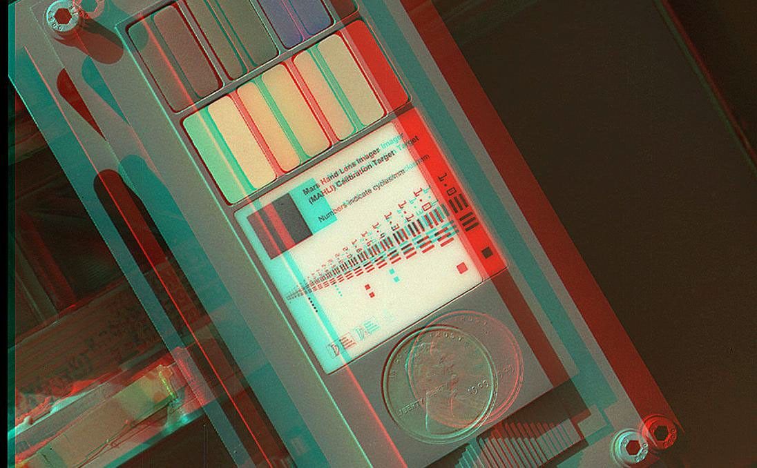 This 3D view of the calibration target for the Mars Hand Lens Imager (MAHLI) aboard NASA's Mars rover Curiosity was assembled from two images taken by that camera during the 34th Martian day, or sol, of Curiosity's work on Mars (Sept. 9, 2012).