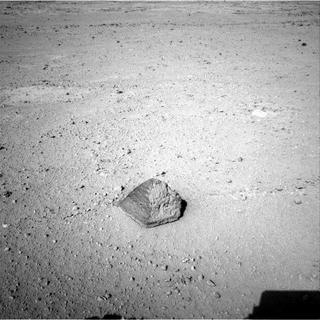 The drive by NASA's Mars rover Curiosity during the mission's 43rd Martian day, or sol, (Sept. 19, 2012) ended with this rock about 8 feet (2.5 meters) in front of the rover.