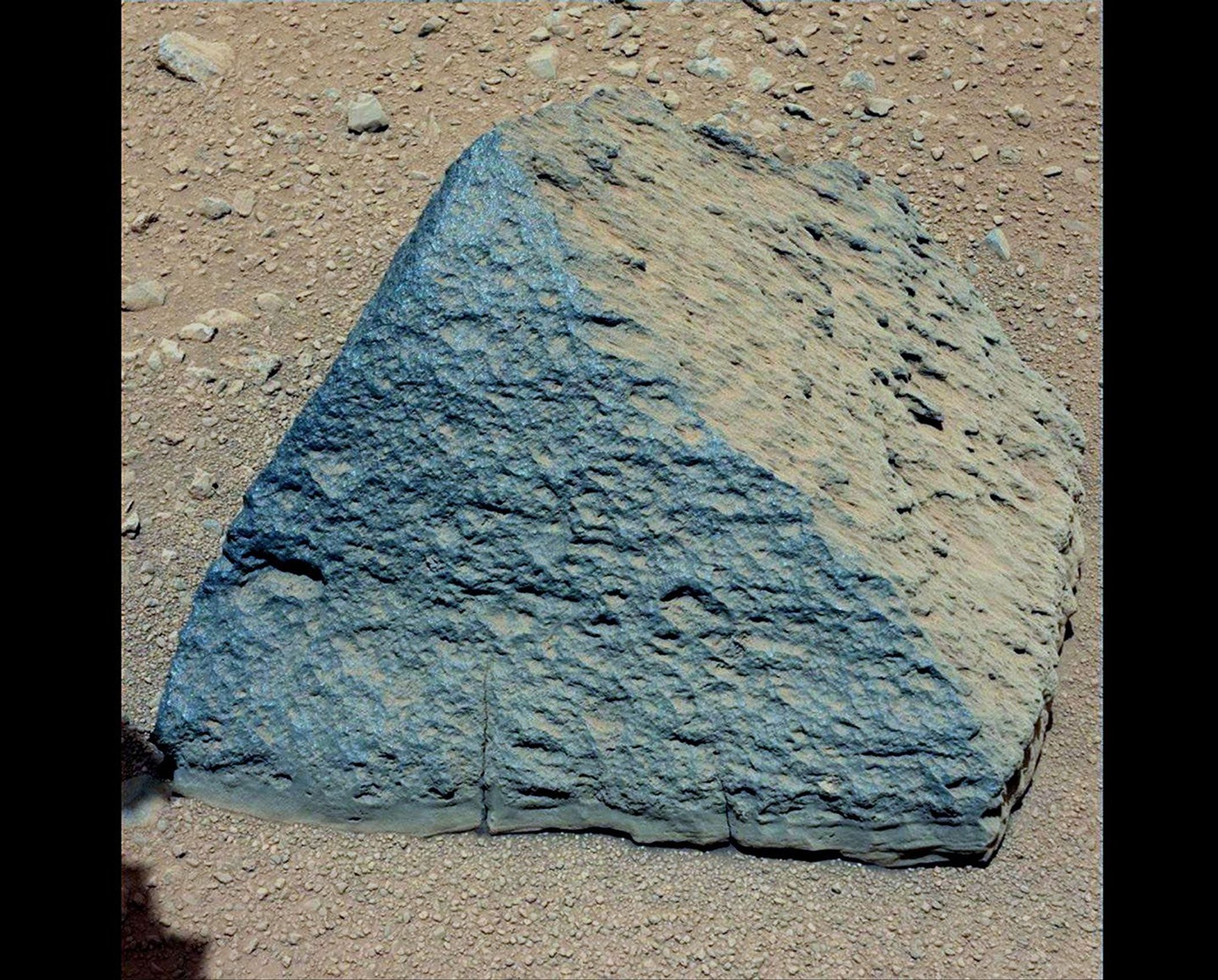 This image shows where NASA's Curiosity rover aimed two different instruments to study a pyramid-shaped rock known as "Jake Matijevic."