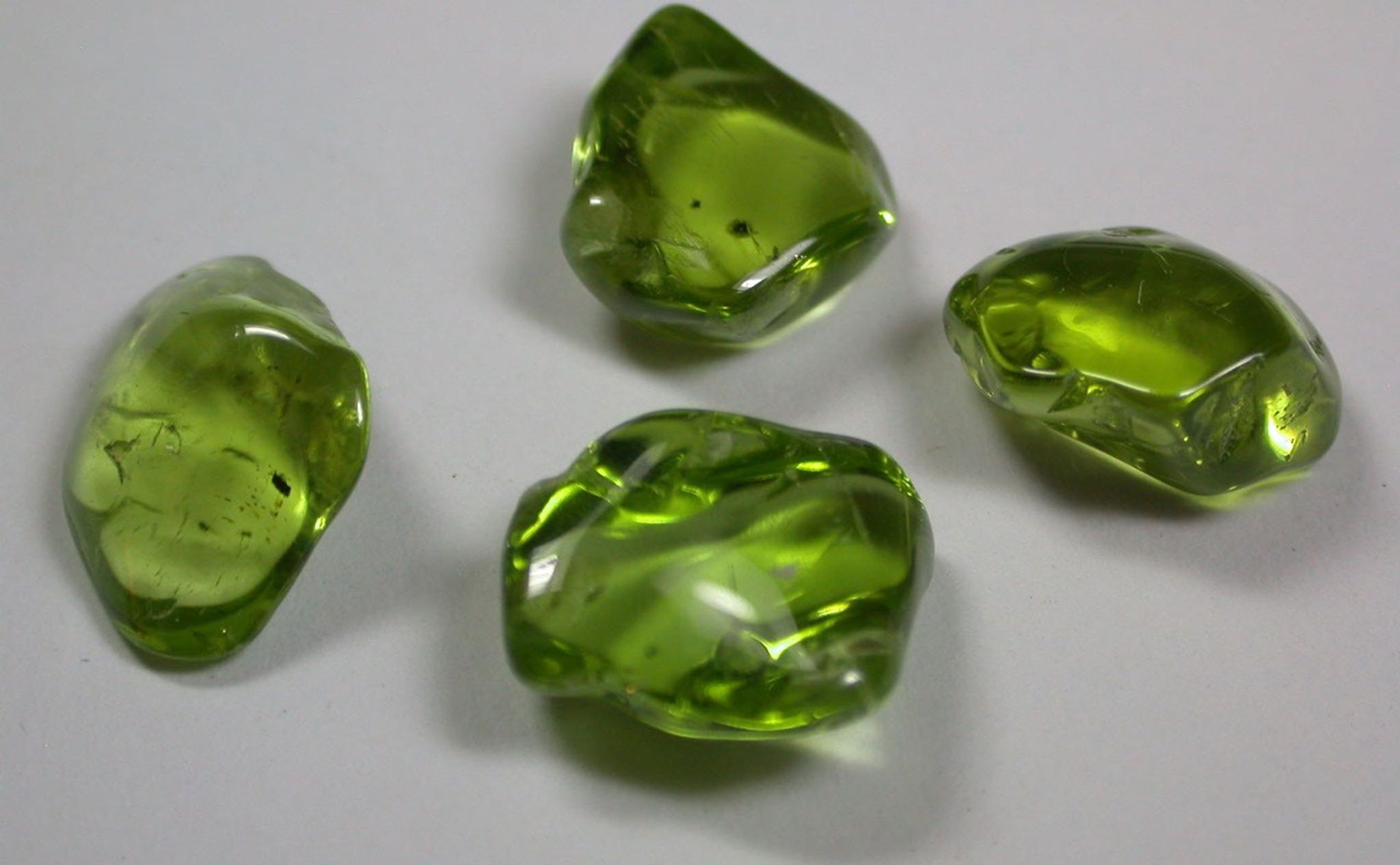 The Martian soil examined by the Chemistry and Mineralogy (CheMin) instrument on NASA's Curiosity rover shows the diffraction signature, or "fingerprint," of the mineral olivine, shown here on Earth in the form of tumbled crystals about a quarter-inch (several millimeters) in size.