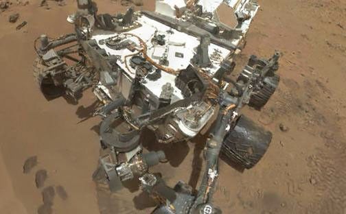Self-portrait of NASA's Curiosity Mars rover uses thumbnail versions of MAHLI component images to give an idea of what a sharper version will look like when the full-frame images are assembled.