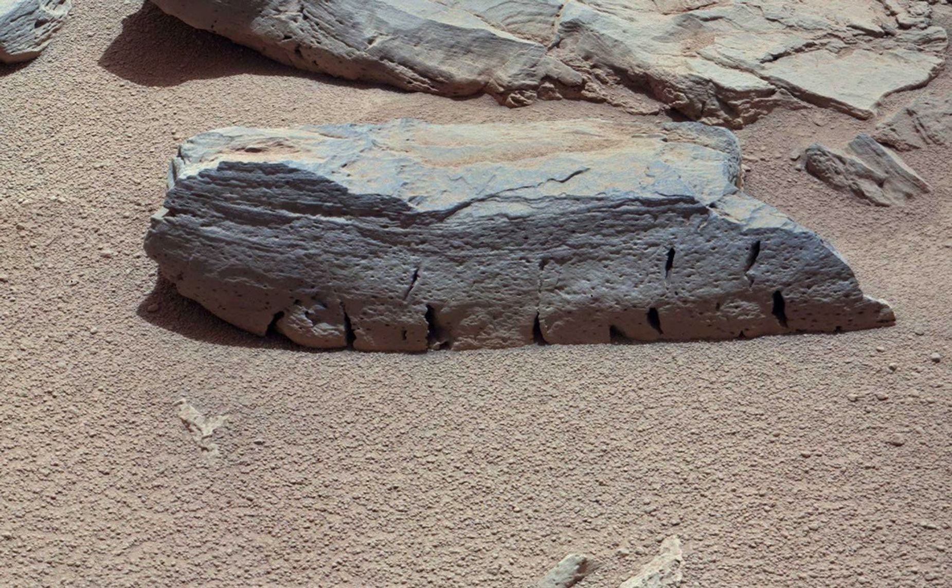 This view of a Martian rock called "Rocknest 3" combines four images taken by the right-eye camera of the Mast Camera (Mastcam) instrument, which has a telephoto, 100-millimeter-focal-length lens.