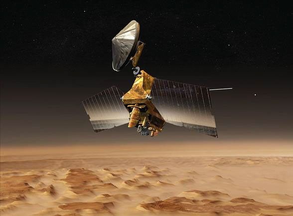 NASA's Mars Reconnaissance Orbiter passes above a portion of the planet called Nilosyrtis Mensae in this artist's concept illustration.