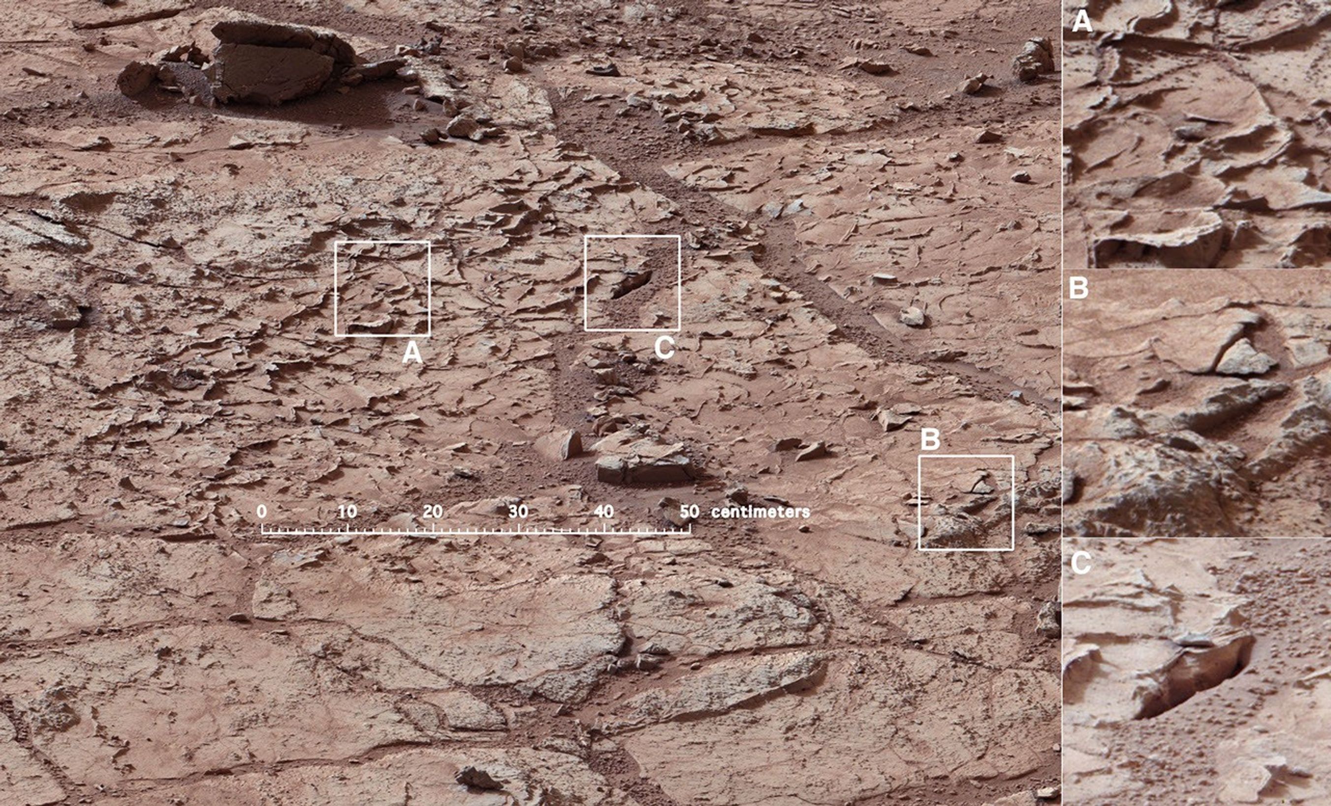 This view shows the patch of veined, flat-lying rock selected as the first drilling site for NASA's Mars rover Curiosity.