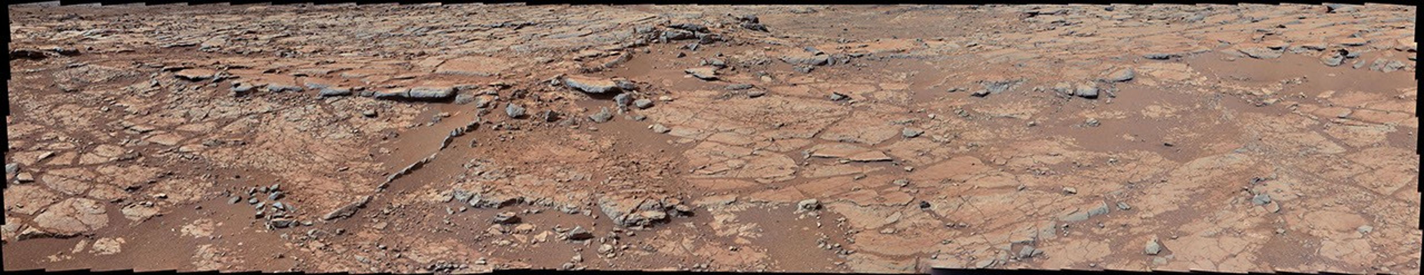 From a position in the shallow "Yellowknife Bay" depression, NASA's Mars rover Curiosity used its right Mast Camera (Mastcam) to take the telephoto images combined into this panorama of geological diversity.