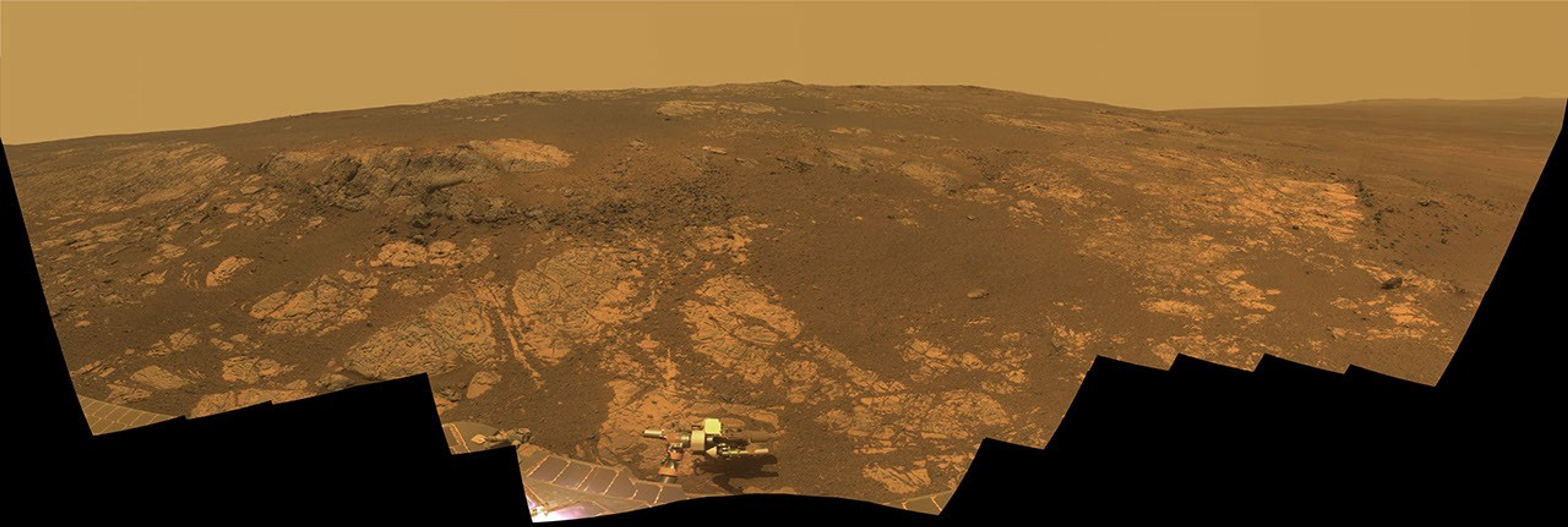As NASA's Mars Exploration Rover Opportunity neared the ninth anniversary of its landing on Mars, the rover was working in the 'Matijevic Hill' area seen in this view from Opportunity's panoramic camera (Pancam).