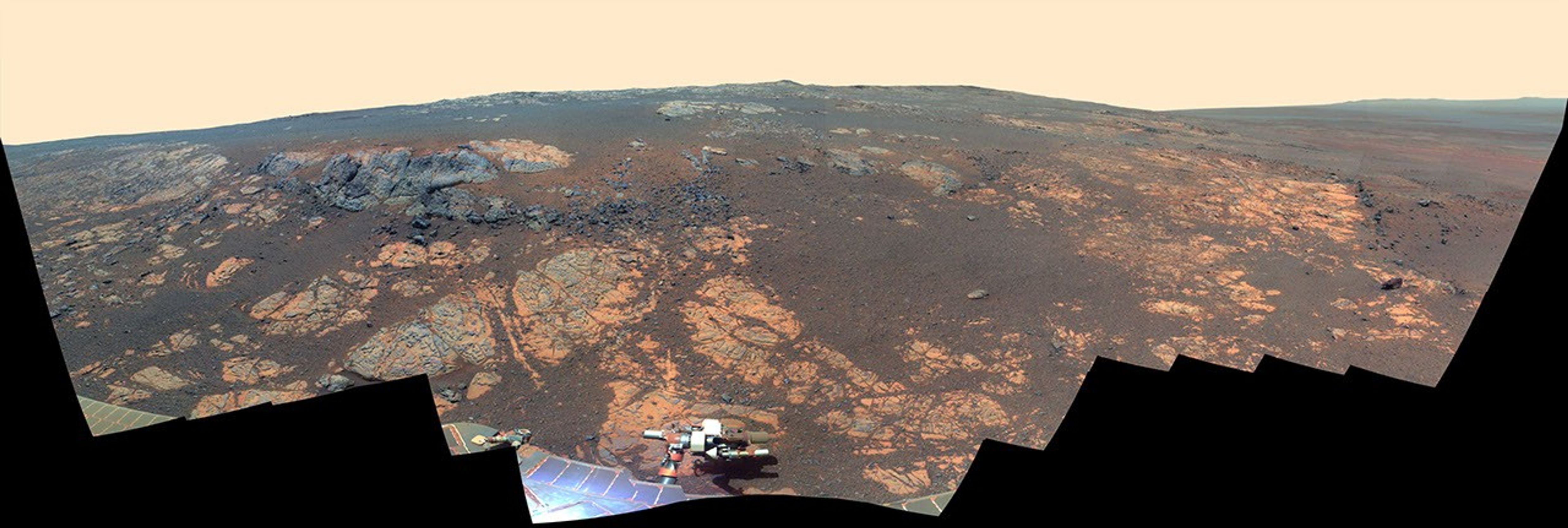 As NASA's Mars Exploration Rover Opportunity neared the ninth anniversary of its landing on Mars, the rover was working in the 'Matijevic Hill' area seen in this view from Opportunity's panoramic camera (Pancam).