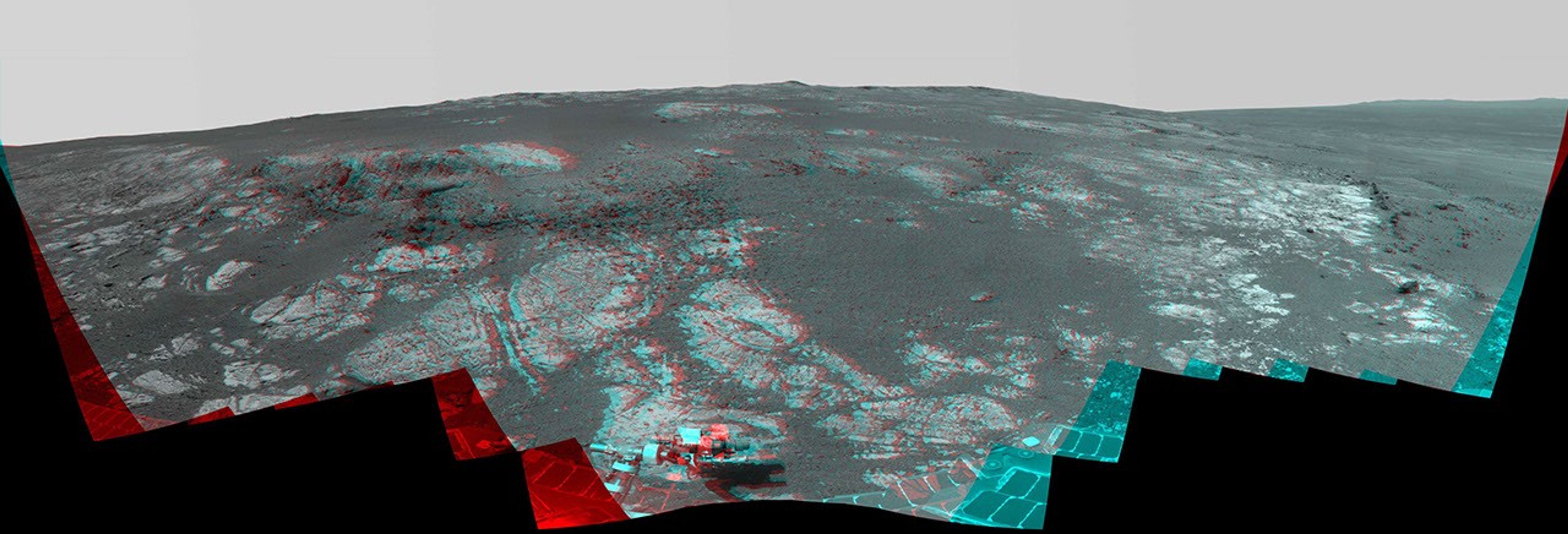 As NASA's Mars Exploration Rover Opportunity neared the ninth anniversary of its landing on Mars, the rover was working in the 'Matijevic Hill' area seen in this stereo view from Opportunity's panoramic camera (Pancam).