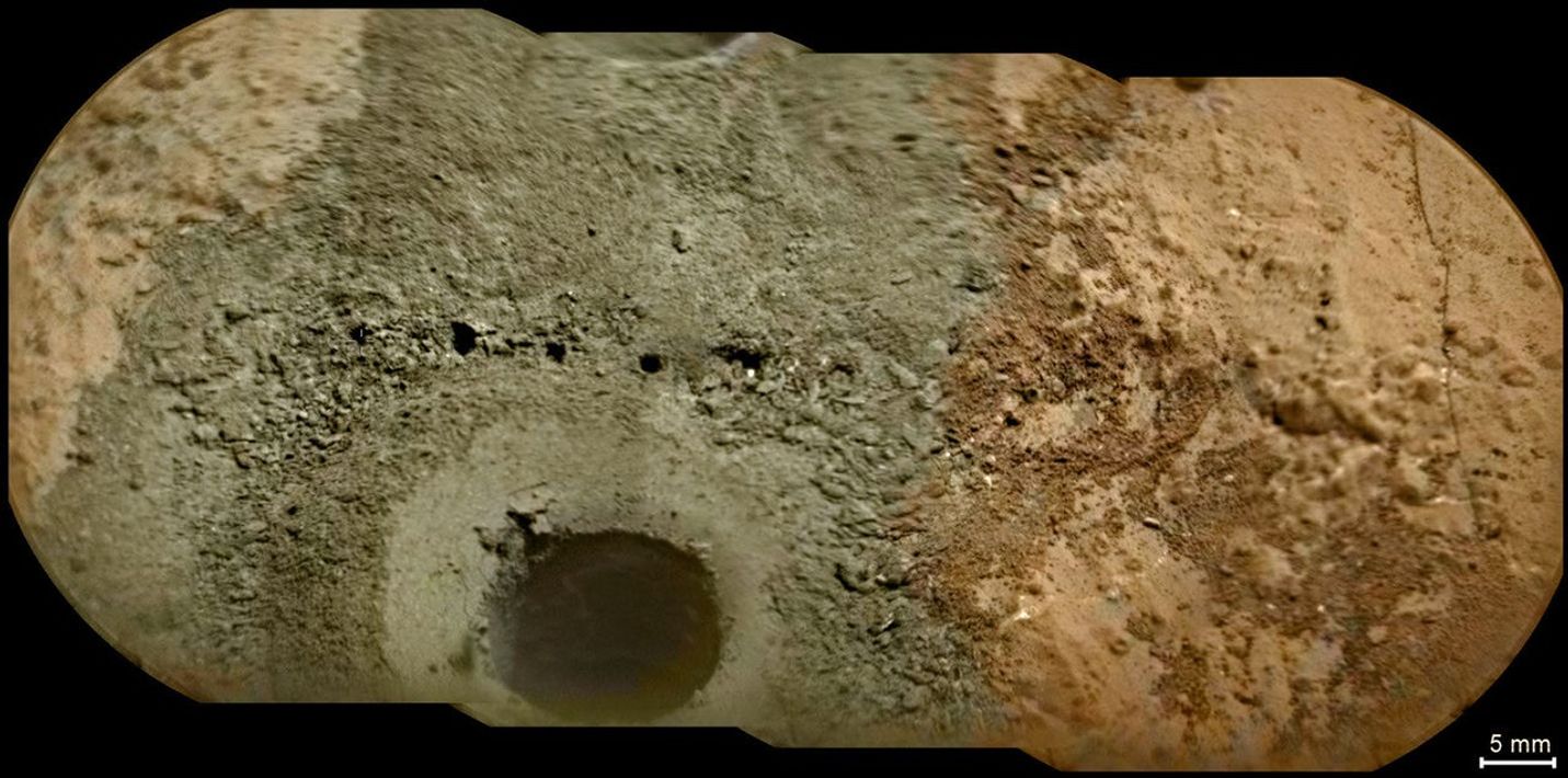 A day after NASA's Mars rover Curiosity drilled the first sample-collection hole into a rock on Mars, the rover's Chemistry and Camera (ChemCam) instrument shot laser pulses into the fresh rock powder that the drilling generated.