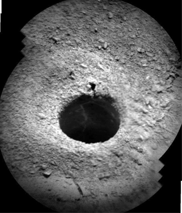 NASA's Curiosity Mars rover targeted the laser of the Chemistry and Camera (ChemCam) instrument with remarkable accuracy for assessing the composition of the wall of a drilled hole and tailings that resulted from the drilling.