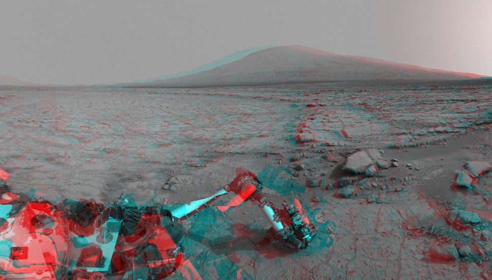 Left and right eyes of the Navigation Camera (Navcam) in NASA's Curiosity Mars rover took the dozens of images combined into this stereo scene of the rover and its surroundings.