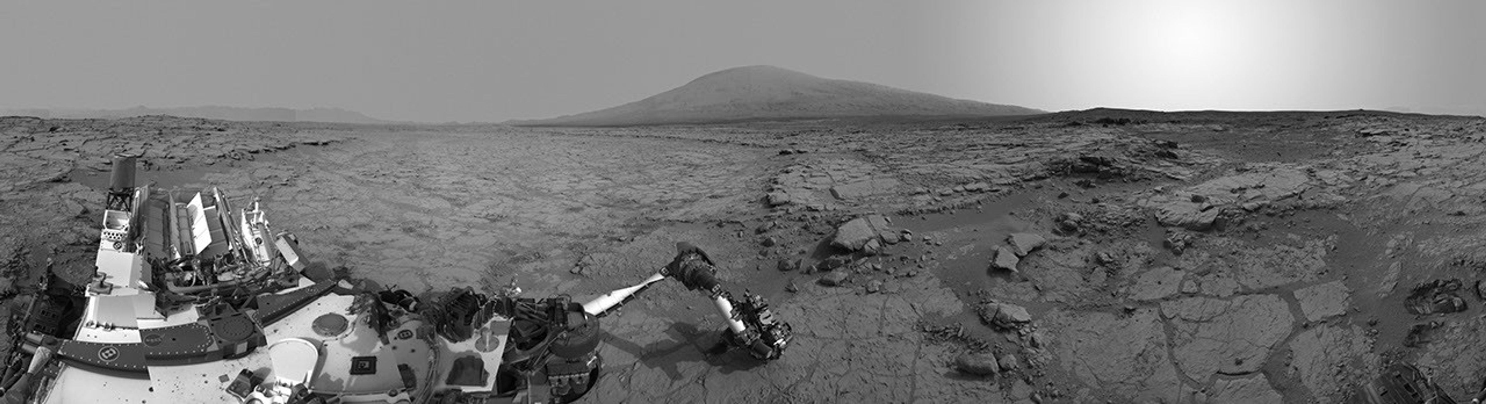 This left-eye member of a stereo pair of images from the Navigation Camera (Navcam) on NASA's Curiosity Mars rover shows a full 360-degree view of the rover's surroundings at the site where it first drilled into a rock.
