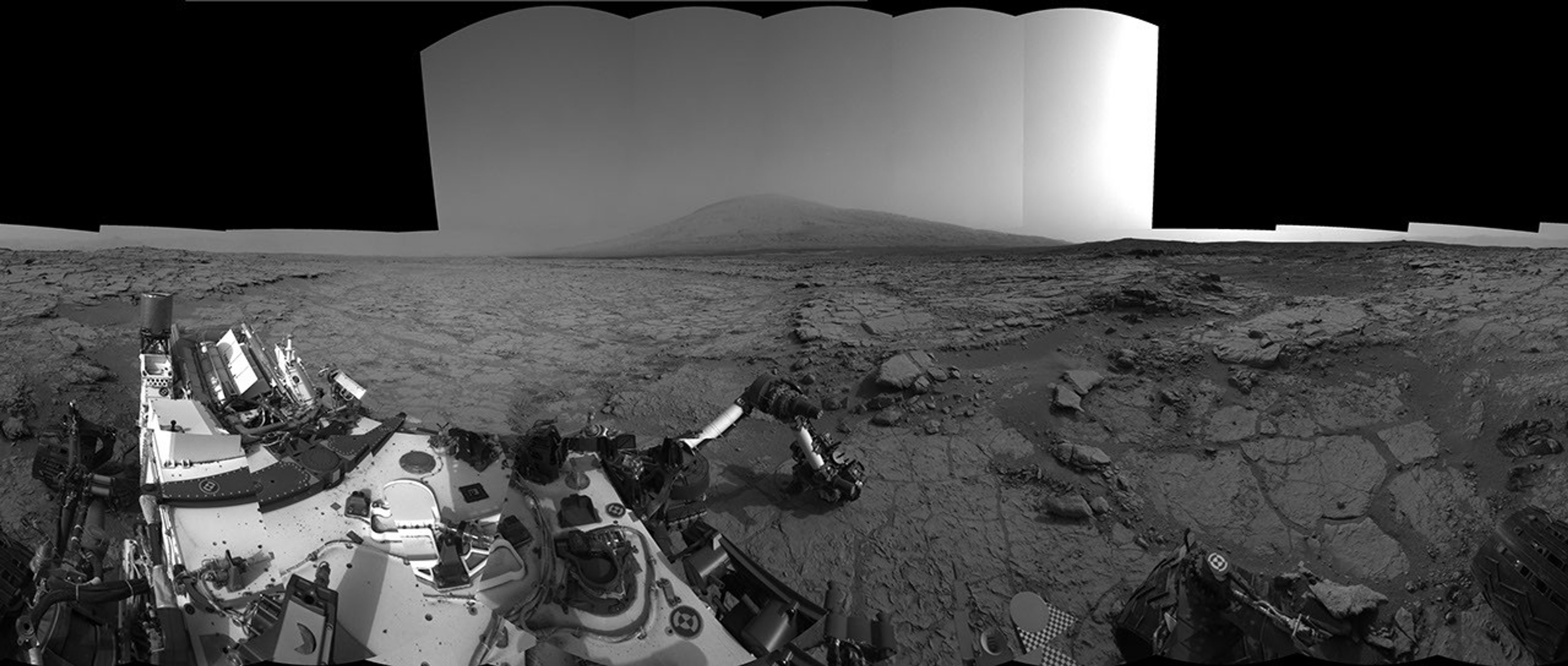 This left-eye member of a stereo pair of images from the Navigation Camera (Navcam) on NASA's Curiosity Mars rover shows a full 360-degree view of the rover's surroundings at the site where it first drilled into a rock.