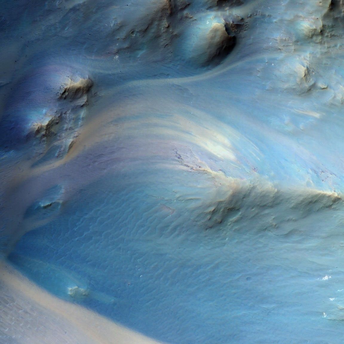 This is an image of a central pit of an impact crater in the Martian ancient highlands.