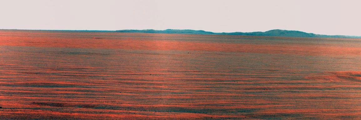 NASA's Mars Exploration Rover Opportunity used its panoramic camera to record this eastward horizon view on the 2,407th Martian day, or sol, of the rover's work on Mars (October 31, 2010).