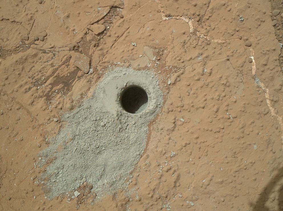 NASA's Mars rover Curiosity drilled into this rock target, "Cumberland," during the 279th Martian day, or sol, of the rover's work on Mars (May 19, 2013) and collected a powdered sample of material from the rock's interior.