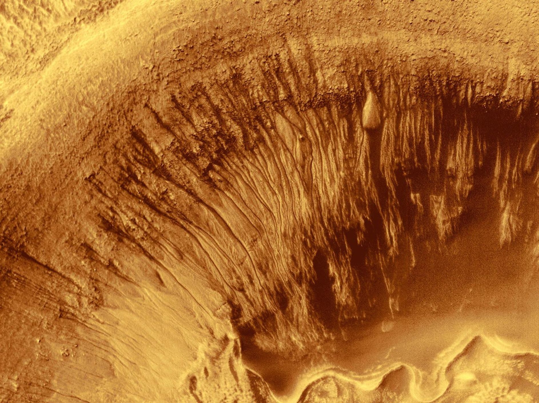 Newton Crater on Mars is a large basin formed by an asteroid impact that probably occurred more than 3 billion years ago. It is approximately 287 km (178 miles) across.