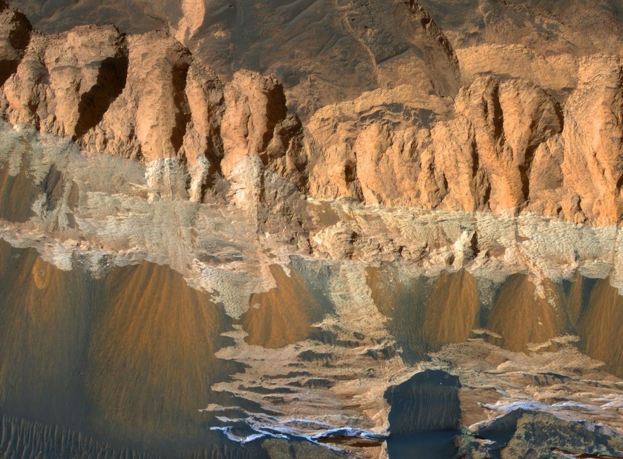 This observation shows erosional features on light-toned rocks in Aram Chaos, a crater near the equator of Mars that has been nearly filled with sedimentary rocks.
