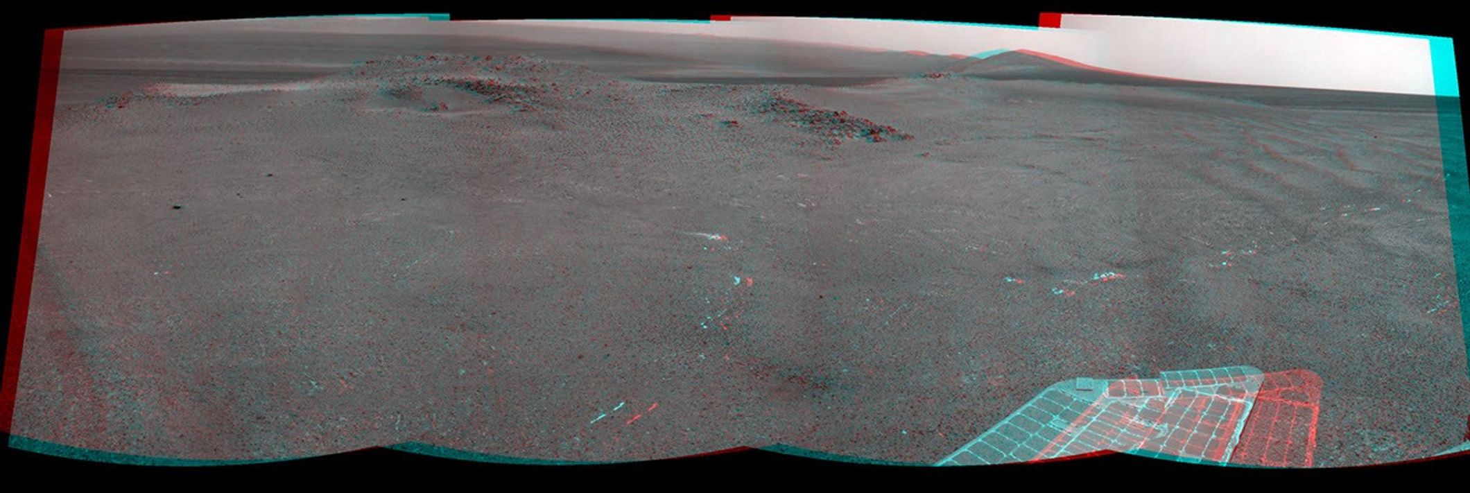 NASA's Mars Exploration Rover Opportunity used its navigation camera (Navcam) to record this stereo view of a rise called "Nobbys Head" during a stop on a multi-week southward drive between two raised segments of the west rim of Endeavour Crater.