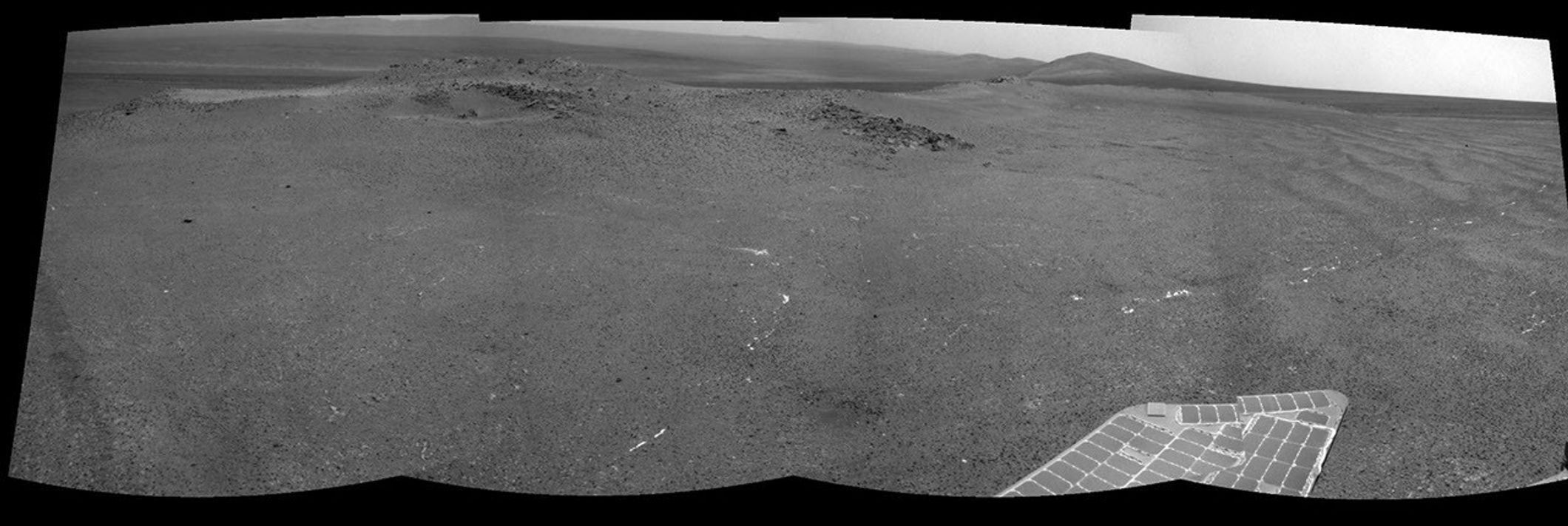 NASA's Mars Exploration Rover Opportunity used its navigation camera to record this view of a rise called "Nobbys Head" during a stop on a multi-week southward drive between two raised segments of the west rim of Endeavour Crater.