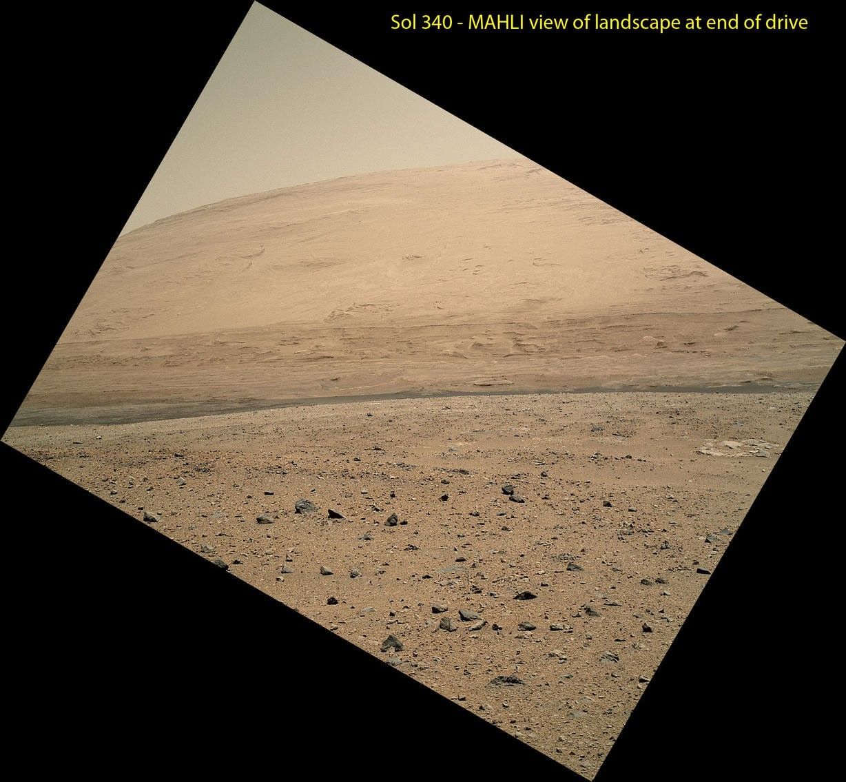 The Mars Hand Lens Imager (MAHLI) camera on NASA's Curiosity rover is carried at an angle when the rover's arm is stowed for driving.