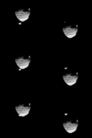 These six images from NASA's Mars rover Curiosity show the two moons of Mars moments before (left three) and after (right three) the larger moon, Phobos, occulted Deimos on Aug. 1, 2013.