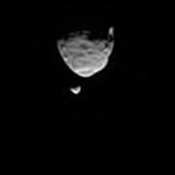 This movie clip shows Phobos, the larger of the two moons of Mars, passing in front of the other Martian moon, Deimos, on Aug. 1, from the perspective of NASA's Mars rover Curiosity.
