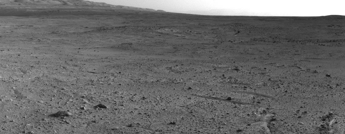 NASA's Mars rover Curiosity captured this view using its Navigation Camera (Navcam) after reaching the top of a rise called "Panorama Point" with a drive during the 388th Martian day, or sol, of the rover's work on Mars (Sept. 8, 2013).