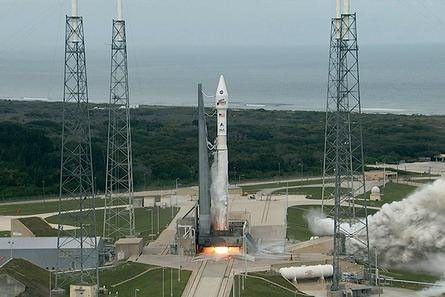 The dual Atlas V rocket engines roar to life on a United Launch Alliance Atlas V rocket at Cape Canaveral Air Force Station's Space Launch Complex 41.