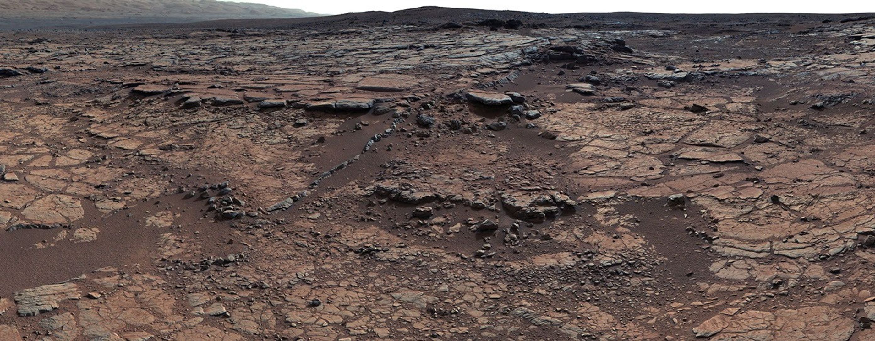 This mosaic of images from Curiosity's Mast Camera (Mastcam) shows geological members of the Yellowknife Bay formation, and the sites where Curiosity drilled into the lowest-lying member, called Sheepbed, at targets "John Klein" and "Cumberland."